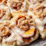 Peach Cobbler Cinnamon Rolls with Crumb Topping